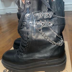 Black chained boots.
